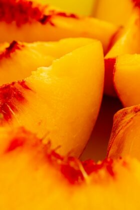 a close up of a bunch of sliced fruit